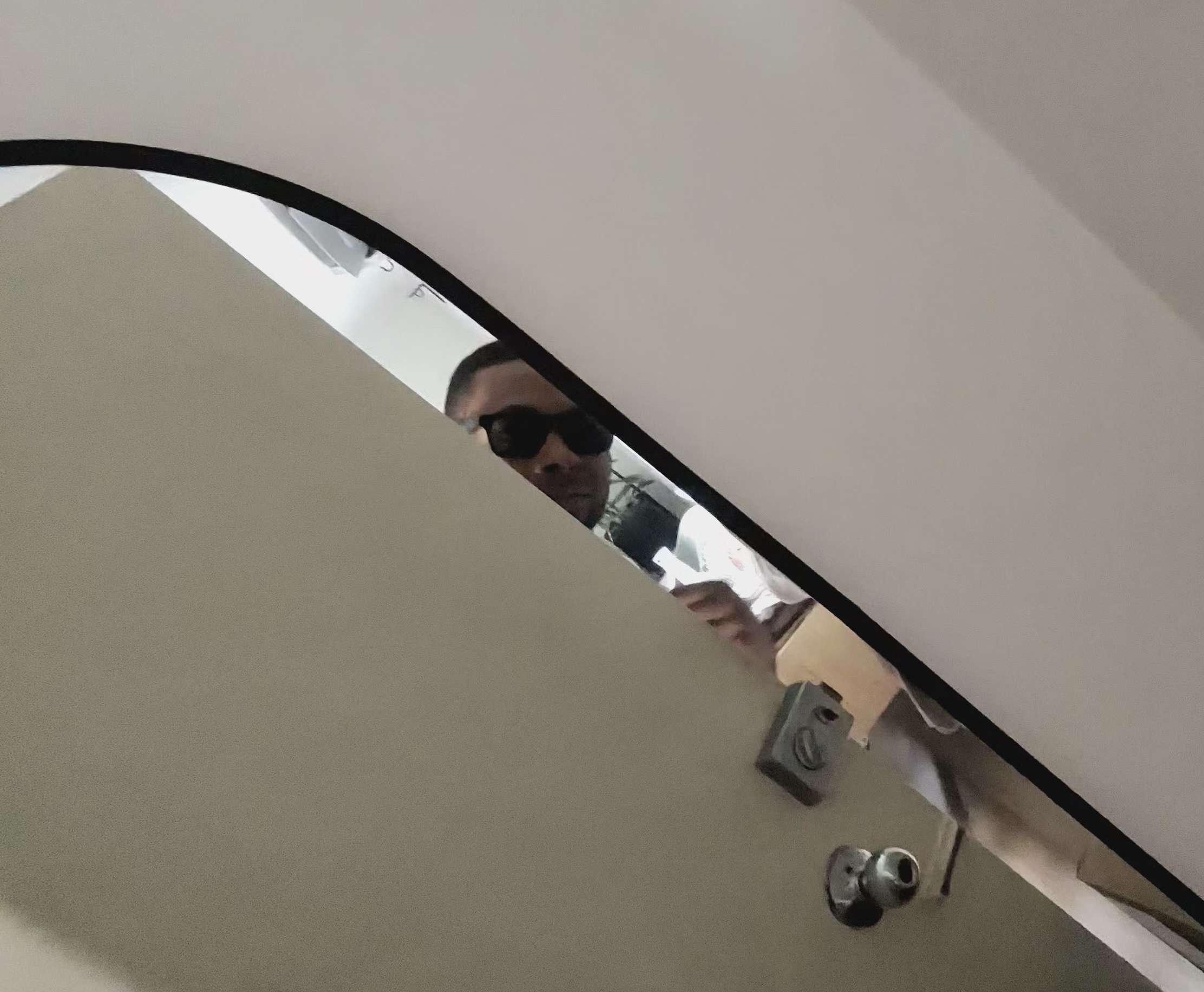 Me wearing RB X Meta Wayfarers in a mirror selfie, kind of